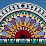 A semi-circular pattern representing the setting sun